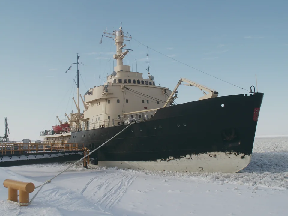 The icebreaker Sampo moored in the ice at Kemi, under a pale winter sky